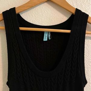 This is a hardly worn GUESS by Marciano black knit beautiful dress